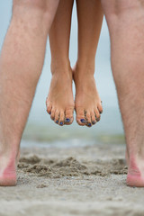 Fototapeta na wymiar Legs of couple