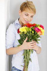 Woman holding a bouquet of flowers