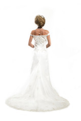 a delicate white wedding dress and long