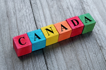 word Canada on colorful wooden cubes