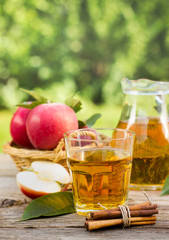 Apple juice in the glass and pitcher