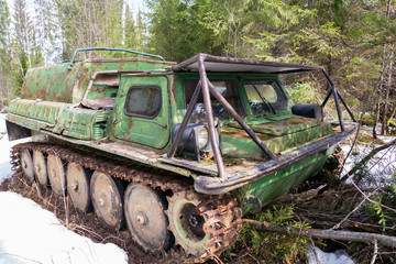 Old skidder at the forest in summertime