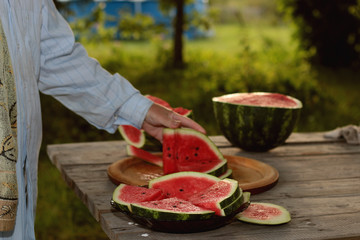 watermelon cutting in nature