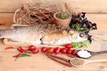 Grilled fish of salt with spicy sauce delicious.
