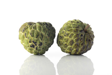 Two Ripened Custard Apples on white Background shot in Studio.