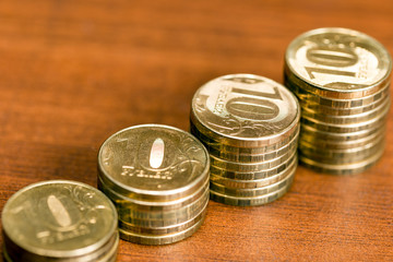 Stacks of gold coins of varying heights