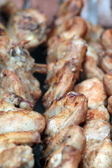 Chicken on the grill to cook