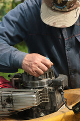 repairing lawn mower engine