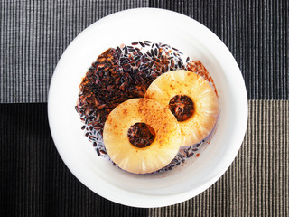 Wild rice with milk and pineapple