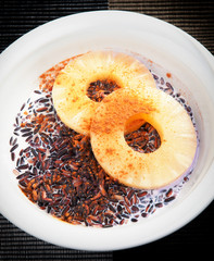 Wild rice with milk and pineapple