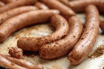 preparing sausages on fire