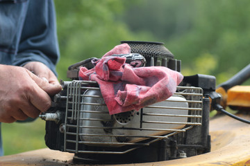 repairing lawn mower engine