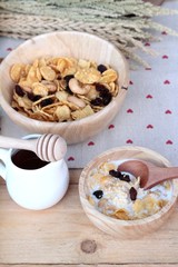 Corn flake with currant dried fruit ,cashew nuts and milk.