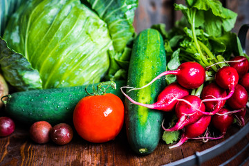 Fresh vegetables on wooden background