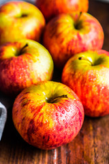 Colorful apples on wooden background