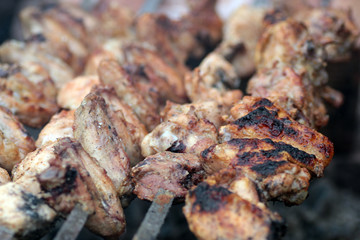 Chicken on the grill to cook