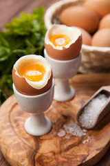 Boiled eggs on a wooden background
