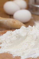 Dough preparation. Baking ingredients: egg and flour.