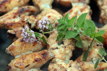 Chicken on the grill to cook