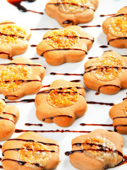 Cookies with chocolate toppling