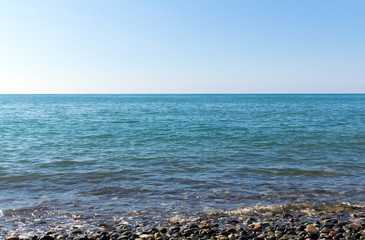 Sea surf on a deserted beach