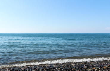 Sea surf on a deserted beach
