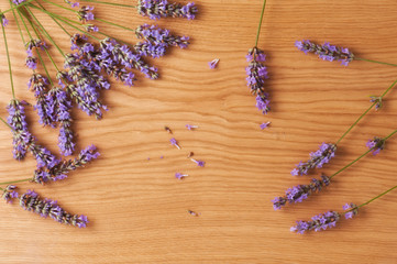 Lavender flowers on vintage wooden boards background
