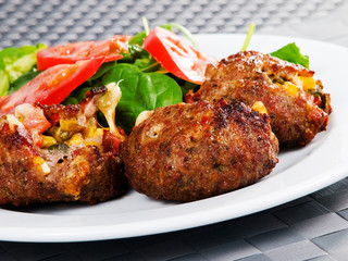 Meatballs with corn and cheese