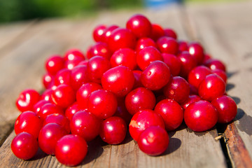 Appetizing cherry on wooden background