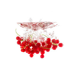 Currants splash on water, isolated on white background. Use for fresh drinks advertising.