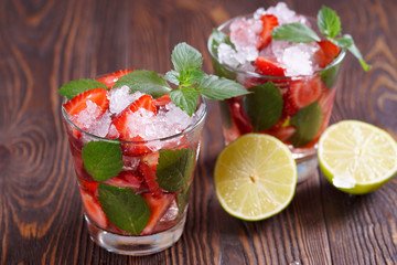 Freshly made strawberry mojitos.