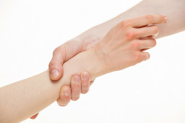 Man giving a helping hand to woman