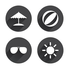 Fototapeta premium Beach holidays icons. Umbrella and Sunglasses.