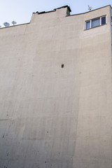 background gray wall of the house with only one window in Istanbul