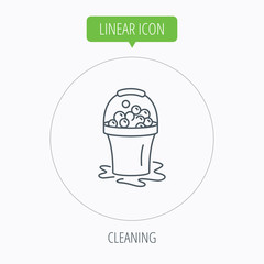 Soapy cleaning icon. Bucket with foam and bubble