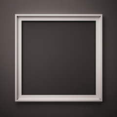 white picture frame on the black wall