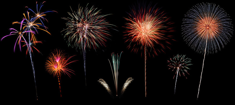Variety of colorful fireworks isolated on black background