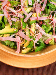 Avocado salad with ham and nuts
