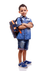 School kid standing with arms crossed on white background