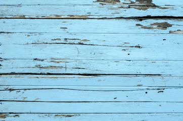 Vintage wood background with peeling paint.