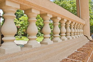 The depth of field of balustrade with beige sandstone Columns.