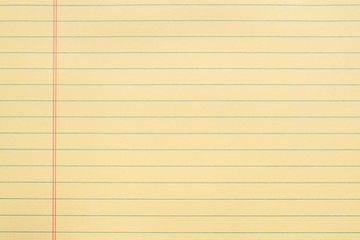 blank yellow notebook page with lines and red margin background