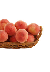 japanese peach in wooden basket on white background