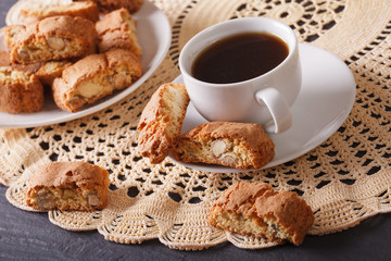 Fragrant coffee and Italian cookies with almonds. horizontal
