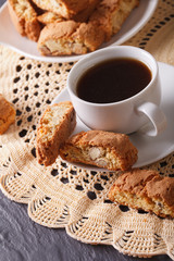 Fragrant coffee and Italian cookies cantuccini closeup. vertical
