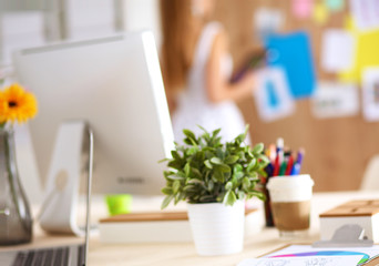 Fashion designers working in studio