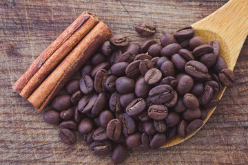 coffee beans and cinnamon on table