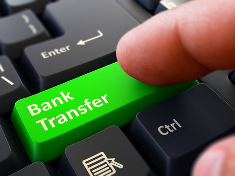 Bank Transfer - Concept on Green Keyboard Button.
