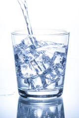 Pouring Water into Glass