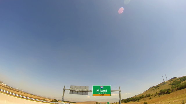4K Driving on Highway/interstate,  Exit sign of the City Of Miami, Florida